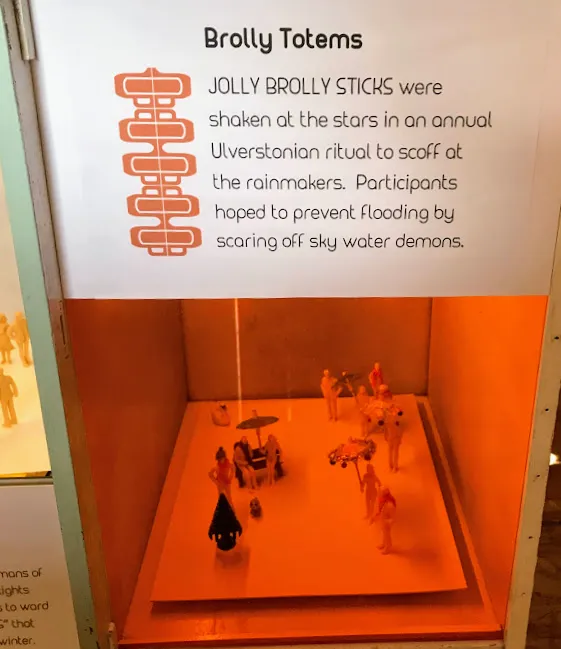 Model people with umbrellas