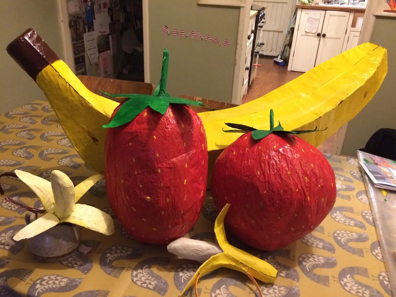 One large card bananas, two small card bananas and two large card strawberries