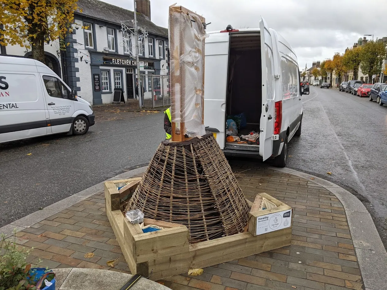 basket woven sides on a wooden structure.