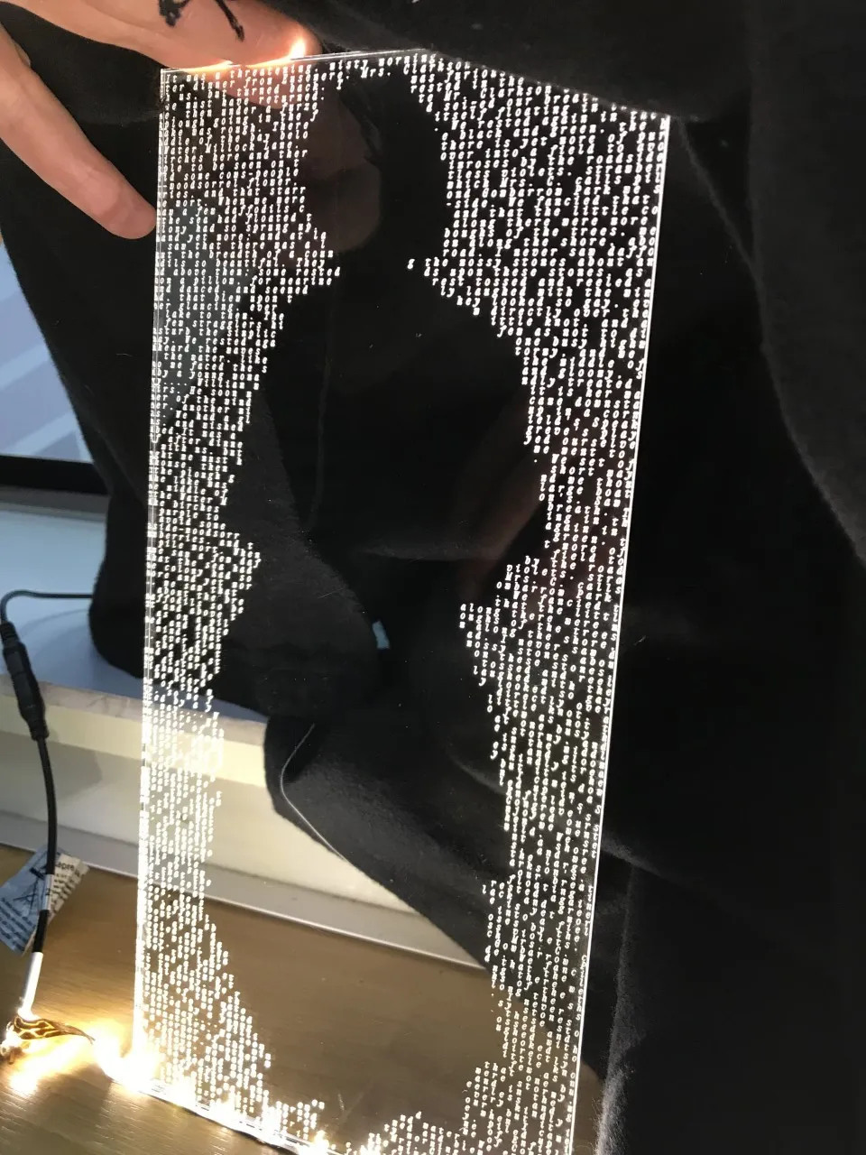 glowing letters on perspex