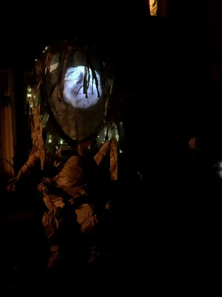 Man's face on witch