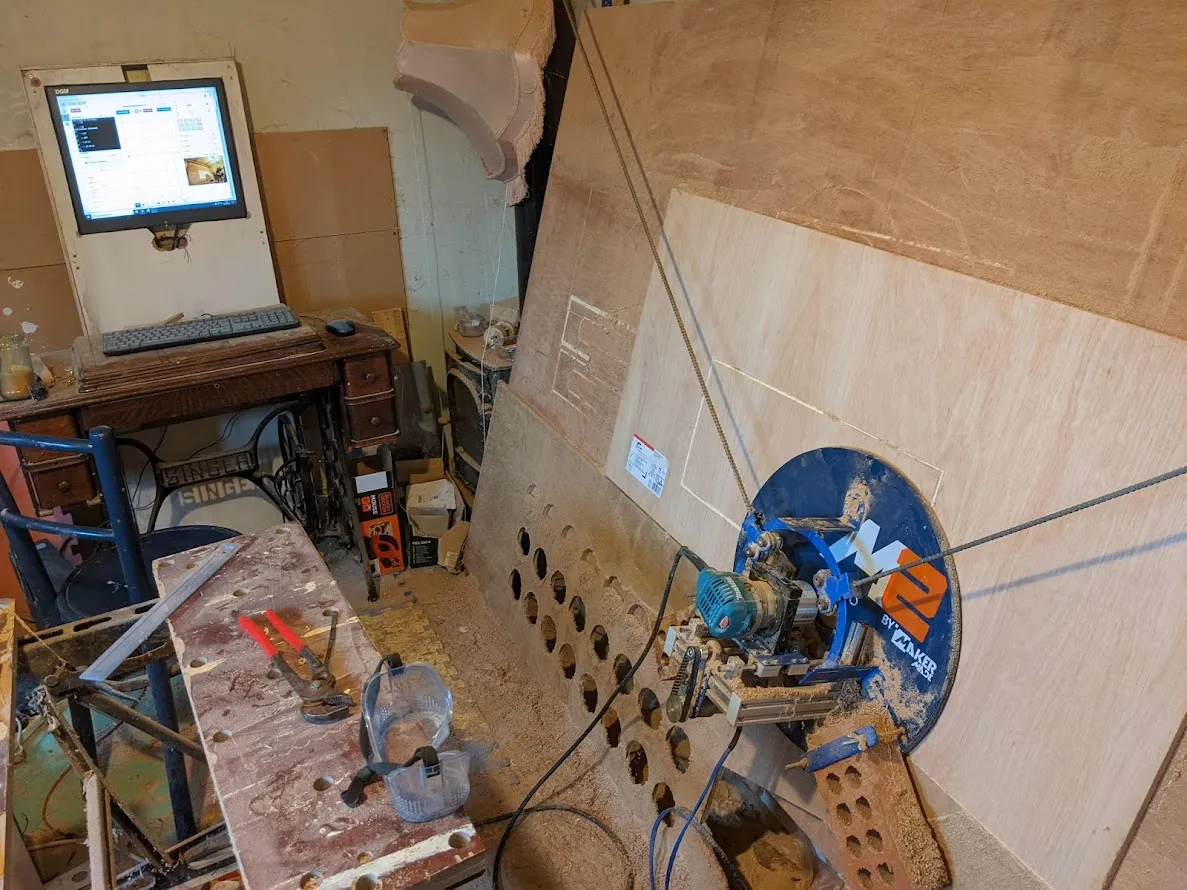 Computer, workbench and hanging cnc machine in a
shed