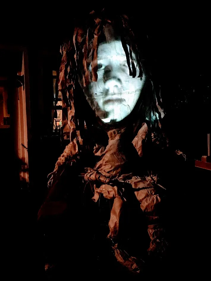 Sullen expression on gill witch