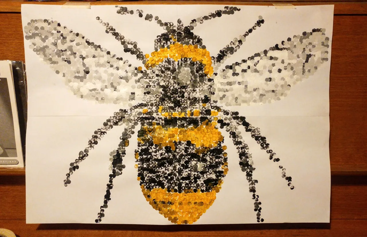 Bee painting made from paint dots.