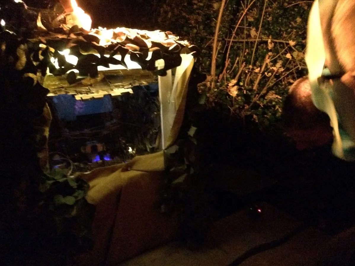 Box at night showing glow from inside.