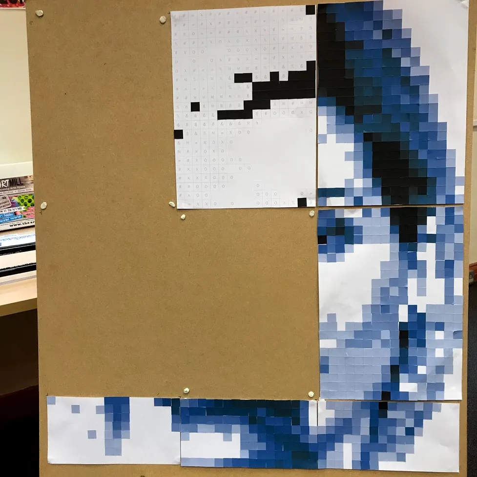 Partial portrait of Jodie Whittaker on a board.