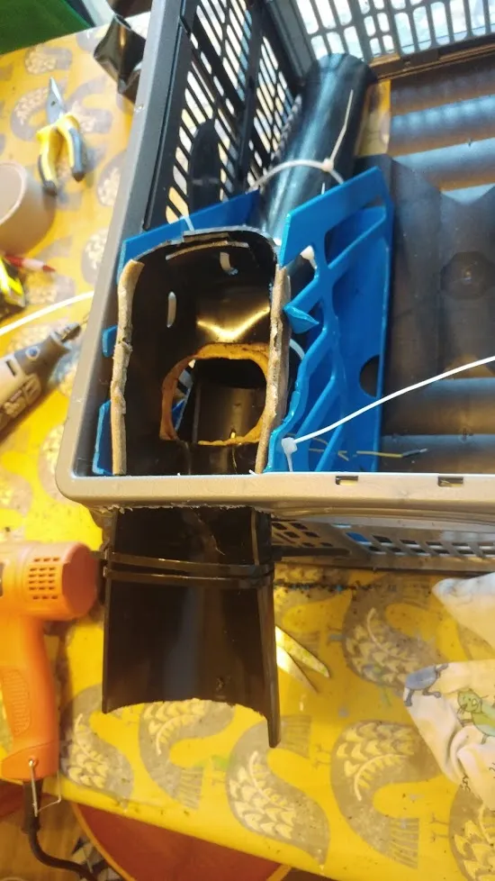 drain pipe with added yellow plastic.