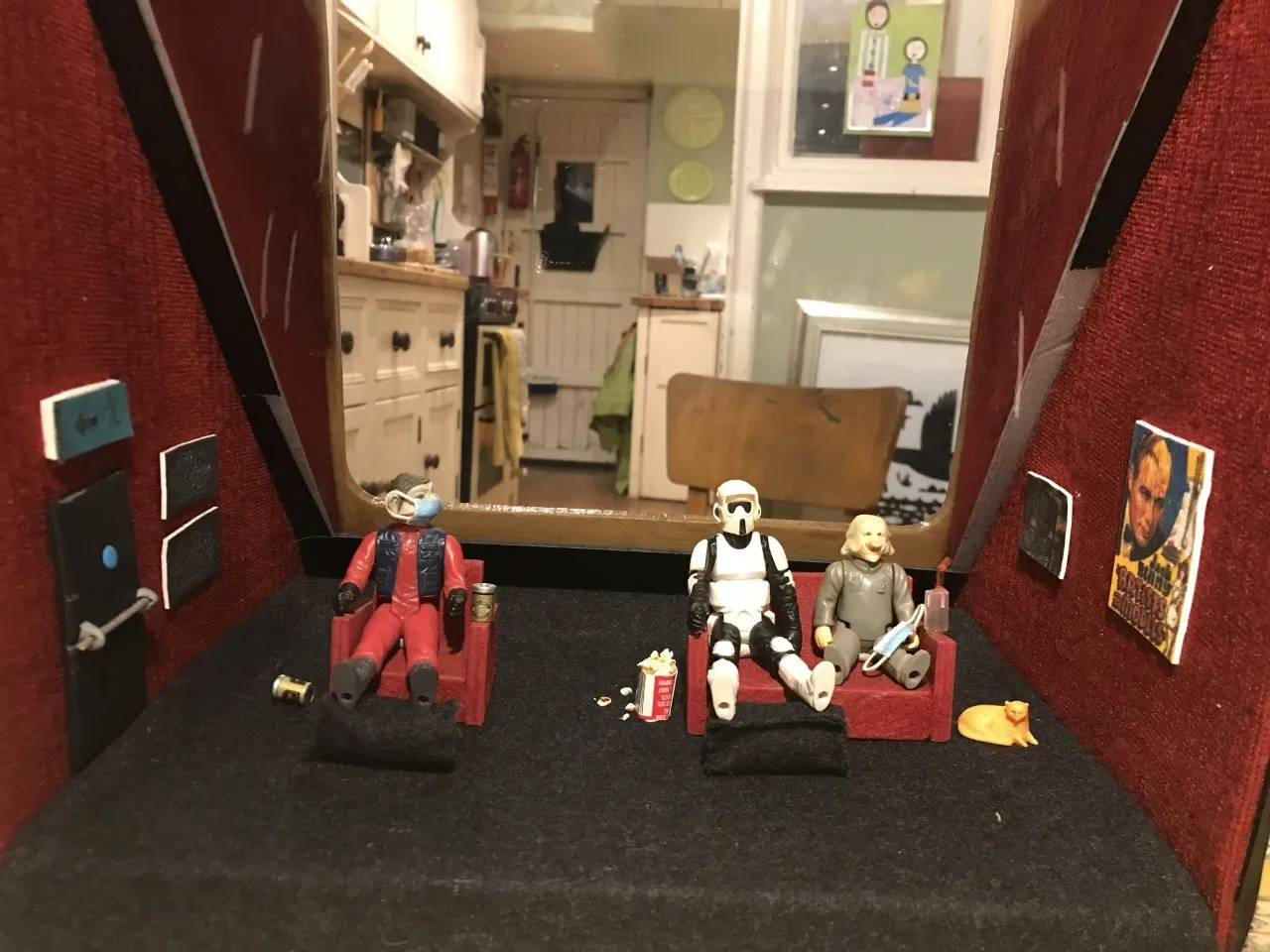 Star Wars action figures sitting in seats