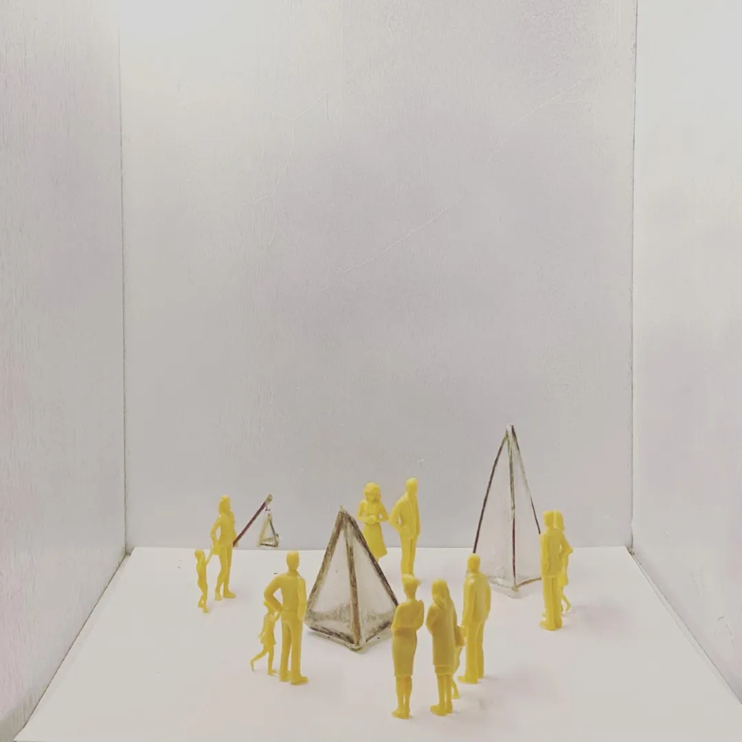 Model people with mini lantern