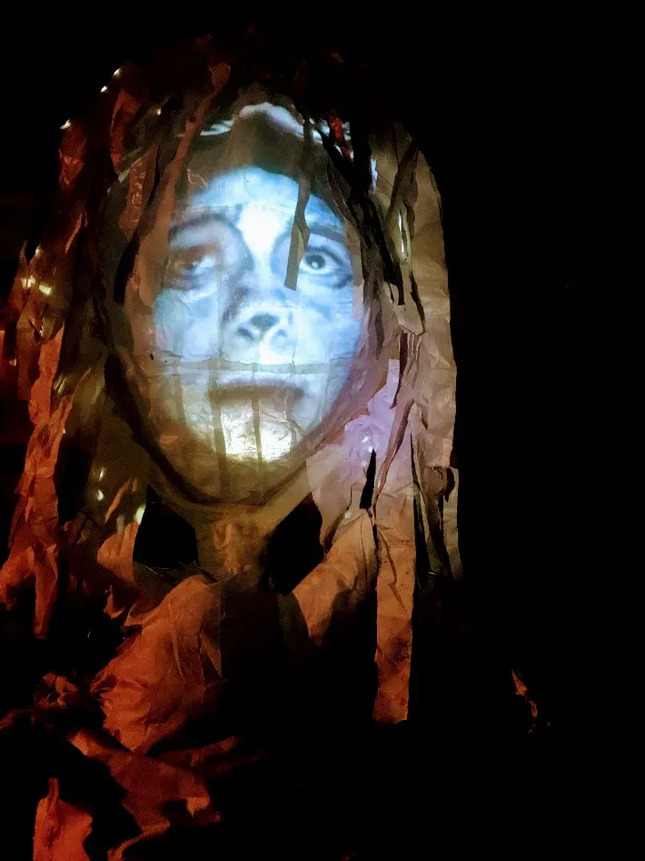 Lady with face paint on the witch