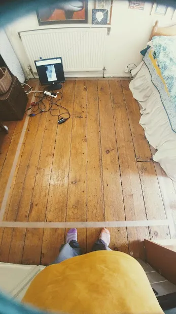 Masking tape rectangle on floor