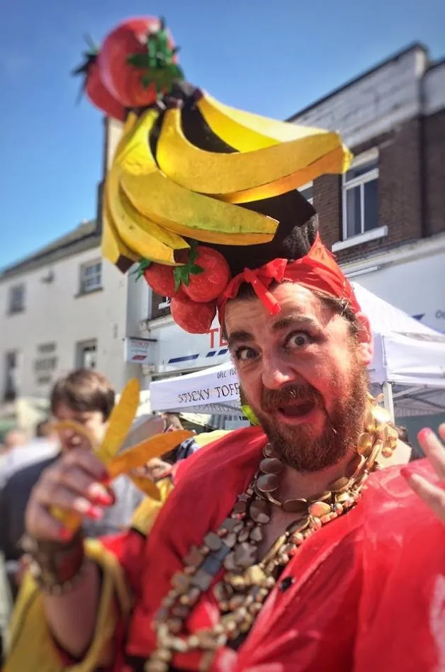 Man dressed as Carmen Miranda