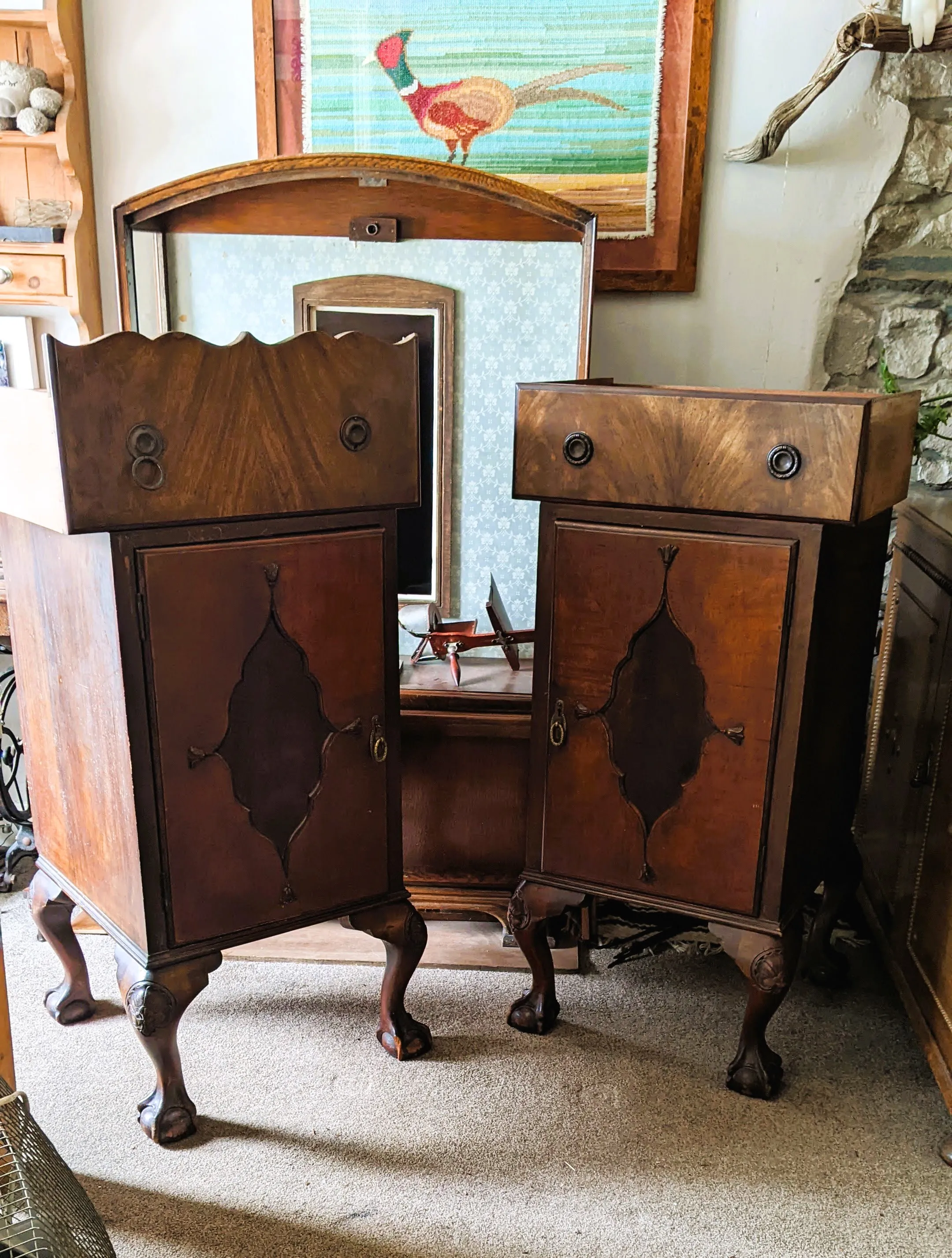 Two cabinets with drawers on top that look like heads and bodies.