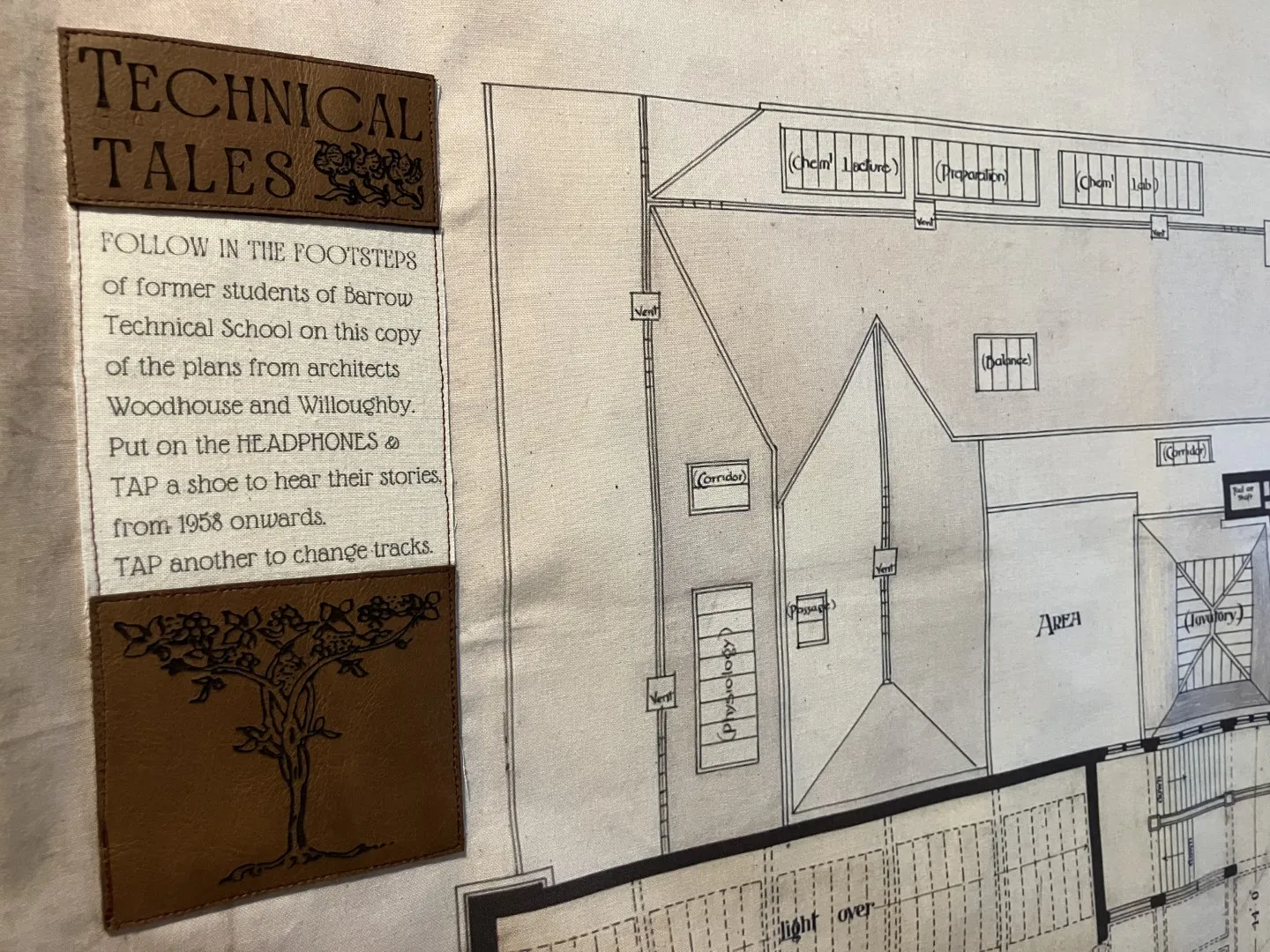 close up of builing plan with leather patches.