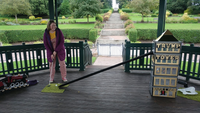 Woman playing golf in bandstand