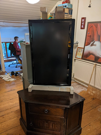 TV sitting sideways (ie tall and narrow) on a corner cabinet